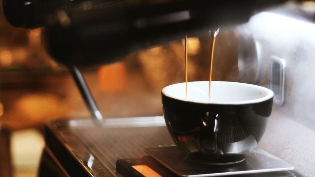 Black Espresso Maker With Cup
