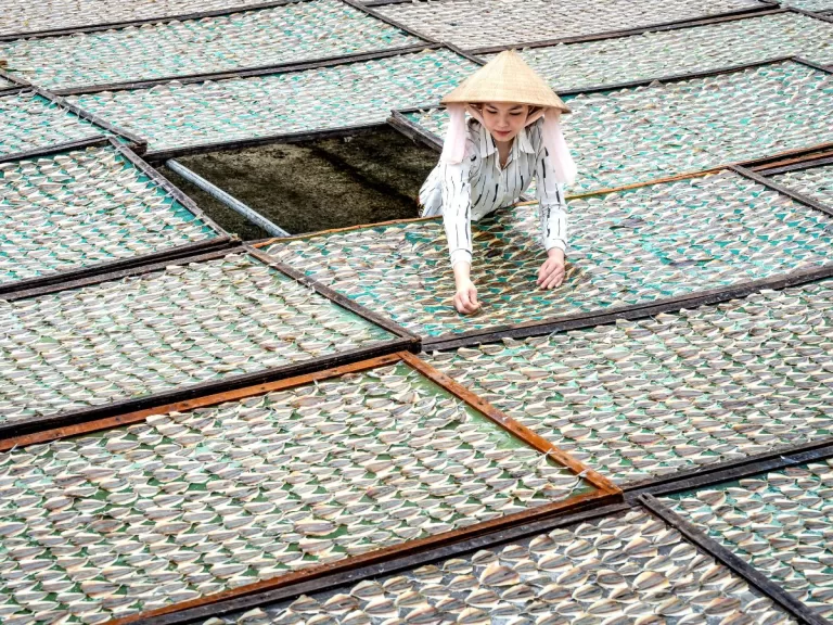 Woman Working at Fish Sauce Production